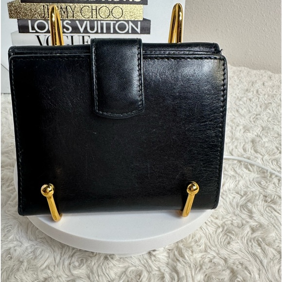 Salvatore Ferragamo Gancini Leather
Compact Wallet Black Gold - Picture 3 of 8